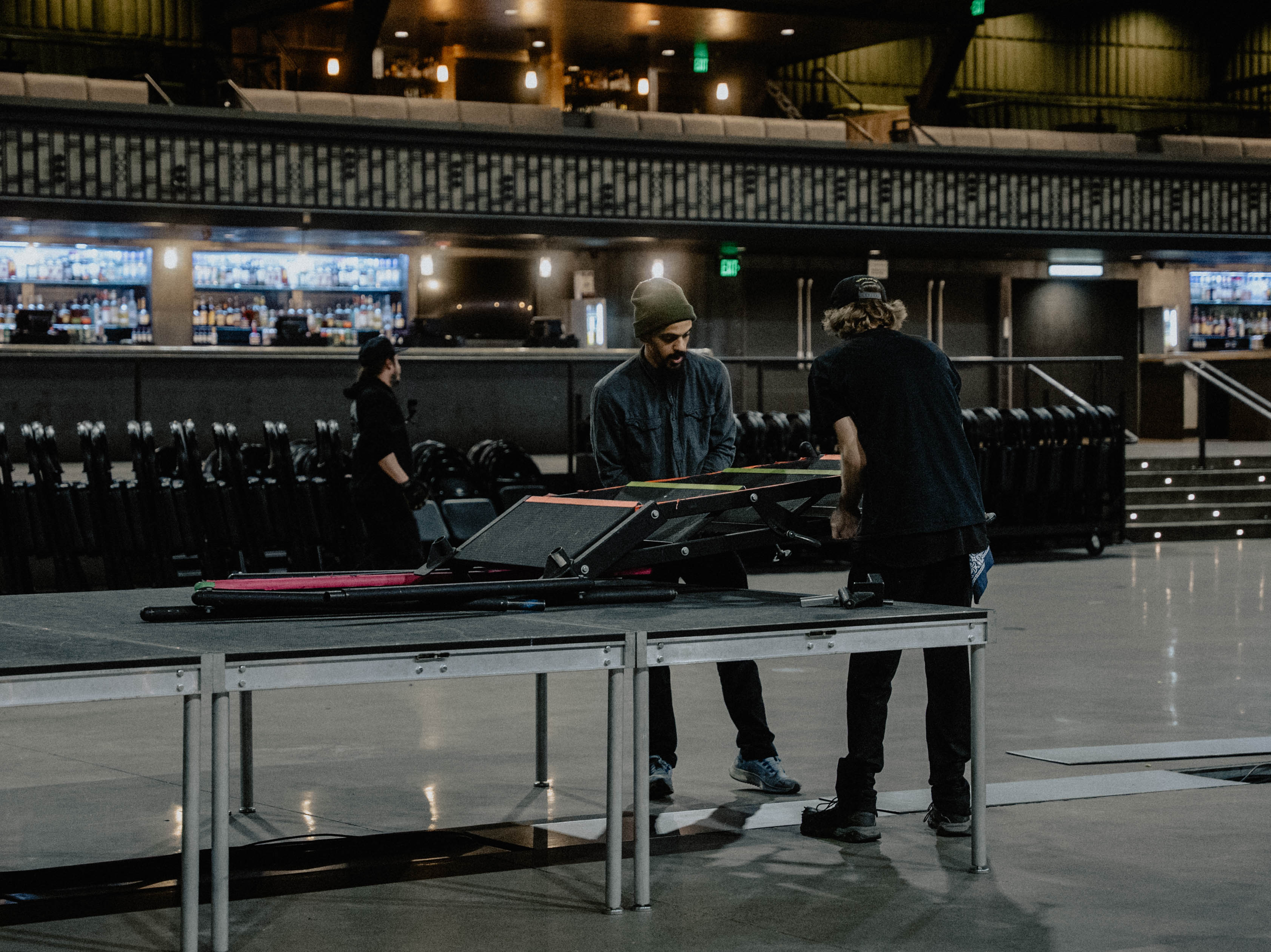 Audio crew patching FOH at a Twin Cities concert